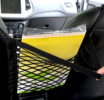 Obrázek z Síťka mezi sedačky s úložným prostorem