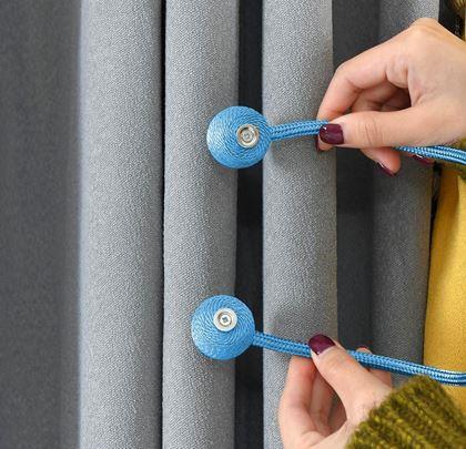 Obrázek z Magnetická spona na závěsy - světle modrá